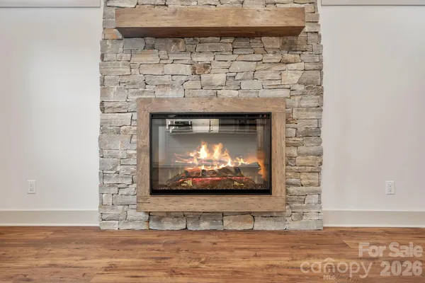 a living room with a fireplace