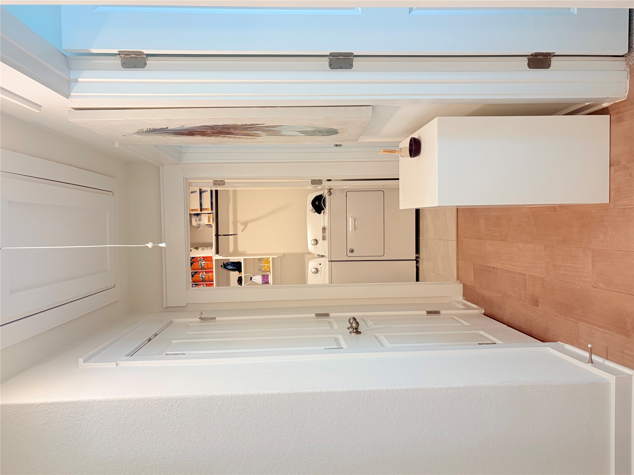 182 Shackleton Drive Kyle, TX 78640 - Photo 4 of 12 Hallway featuring separate washer and dryer and cooling unit