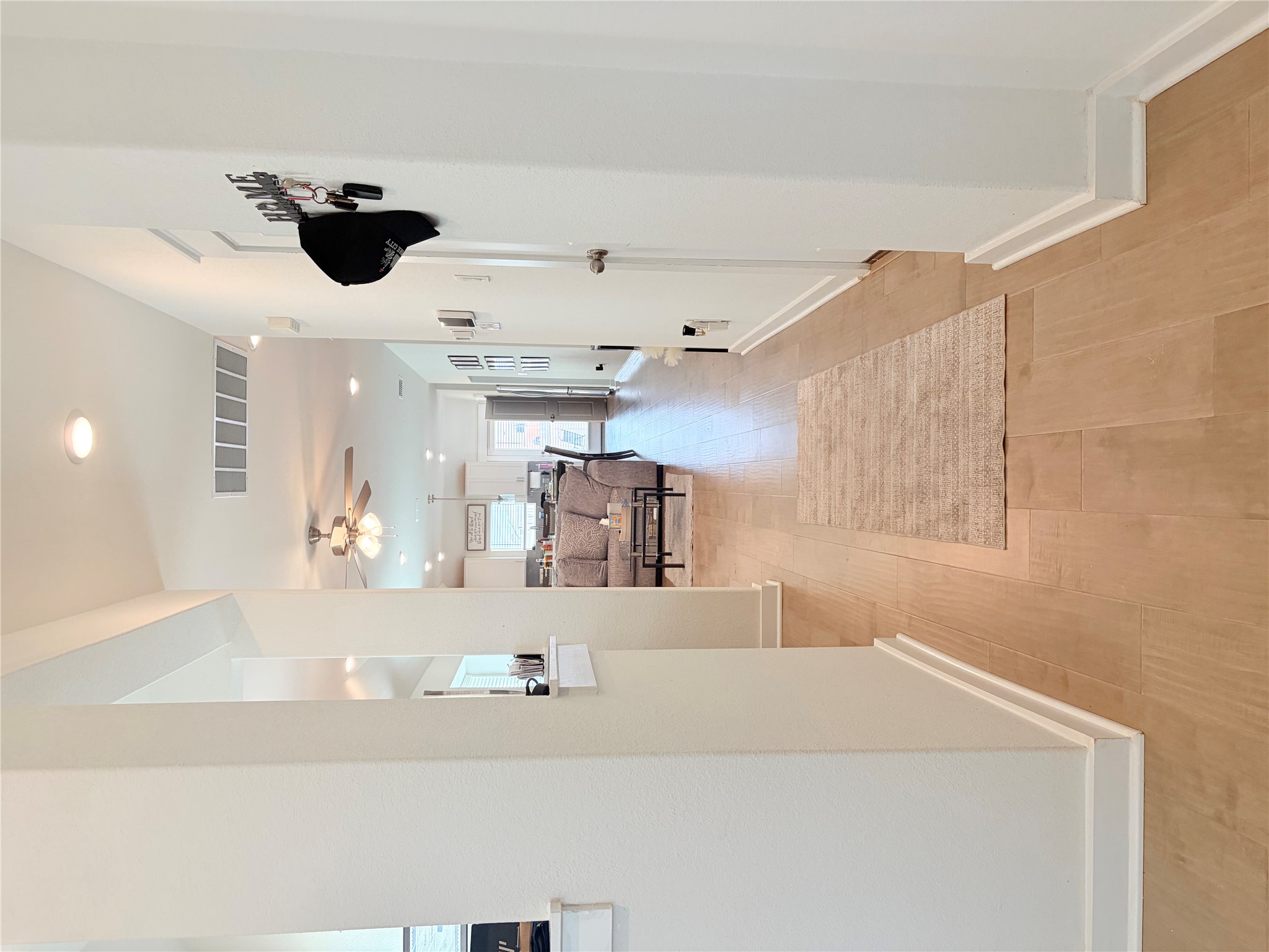 182 Shackleton Drive Kyle, TX 78640 - Photo 10 of 12 Corridor featuring baseboards and light wood-type flooring