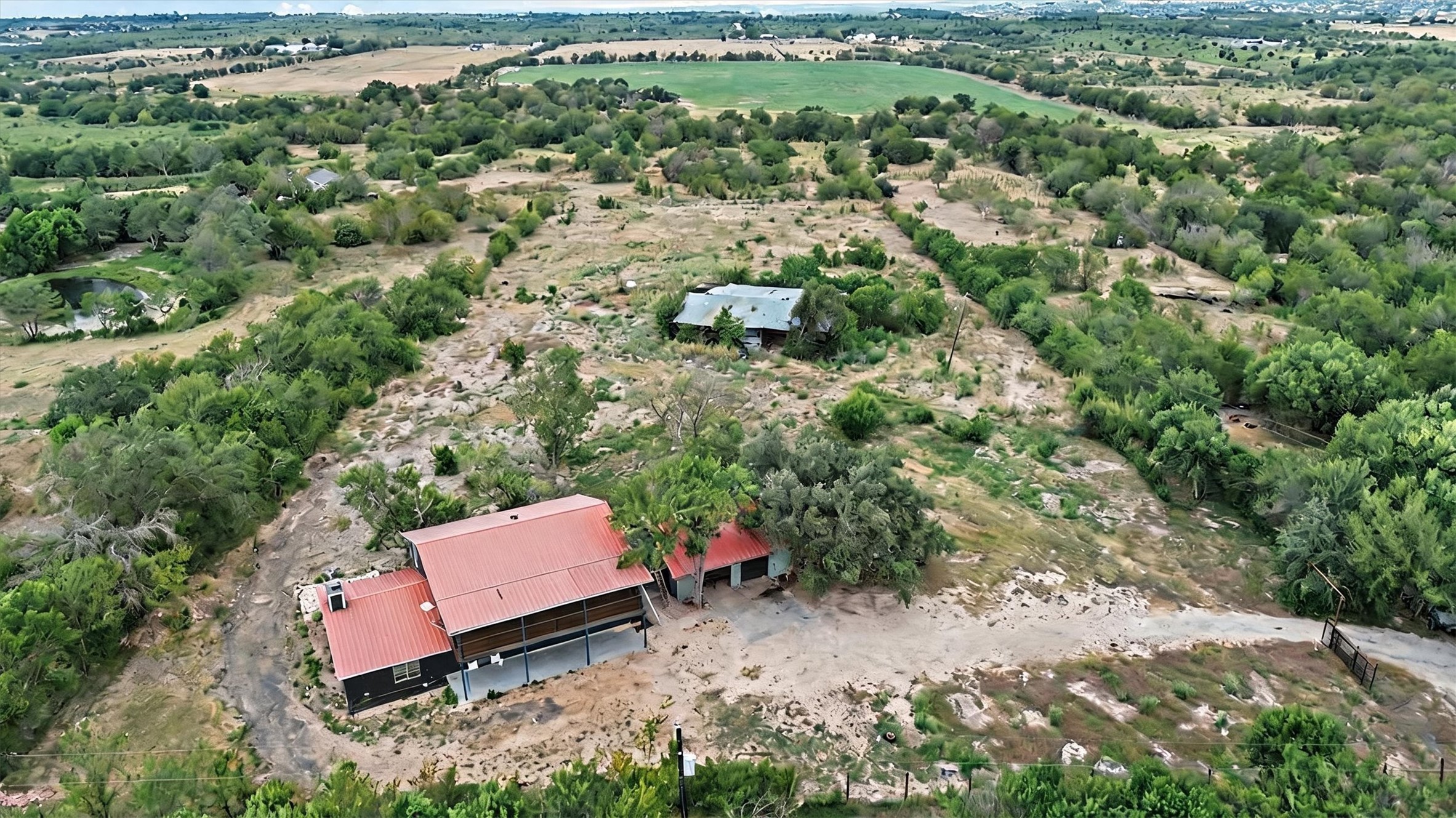 9100 Highway 183 Austin, TX 78747 - Photo 30 of 38 Rolling hills and mature trees surround this secluded rural property with immense potential.