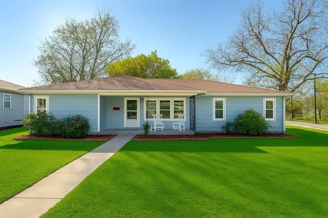 front view of a house and a yard