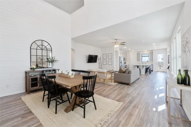 a view of a livingroom with furniture and wooden floor