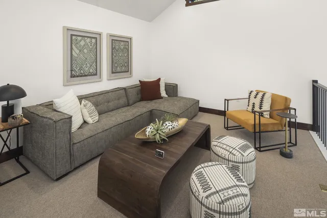 a living room with furniture and a couch