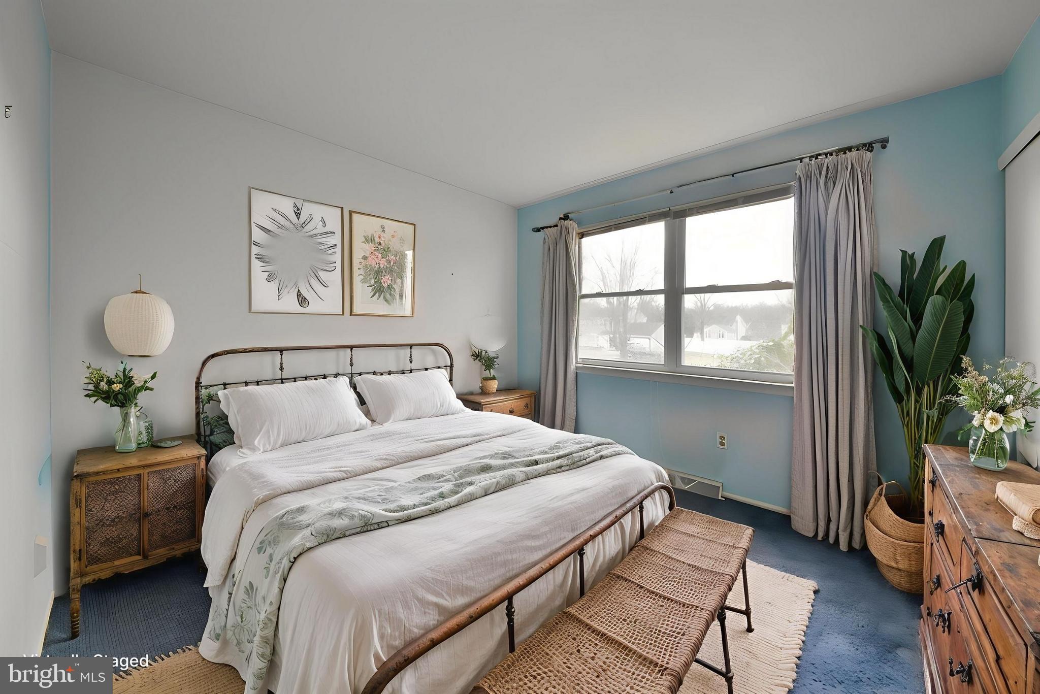 13 Glen Road Lansdale, PA 19446 - Photo 19 of 33 a bedroom with a bed and a window