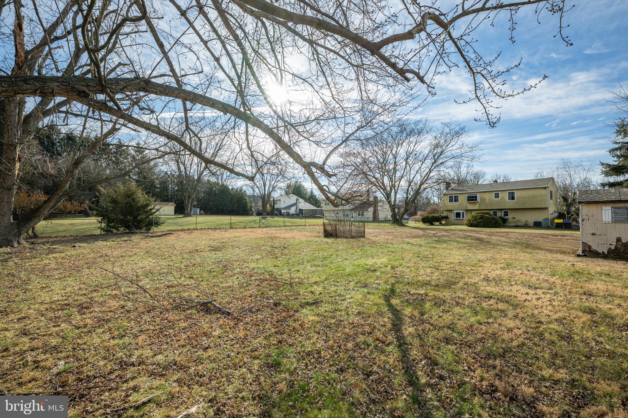 13 Glen Road Lansdale, PA 19446 - Photo 4 of 33 a view of road with large trees