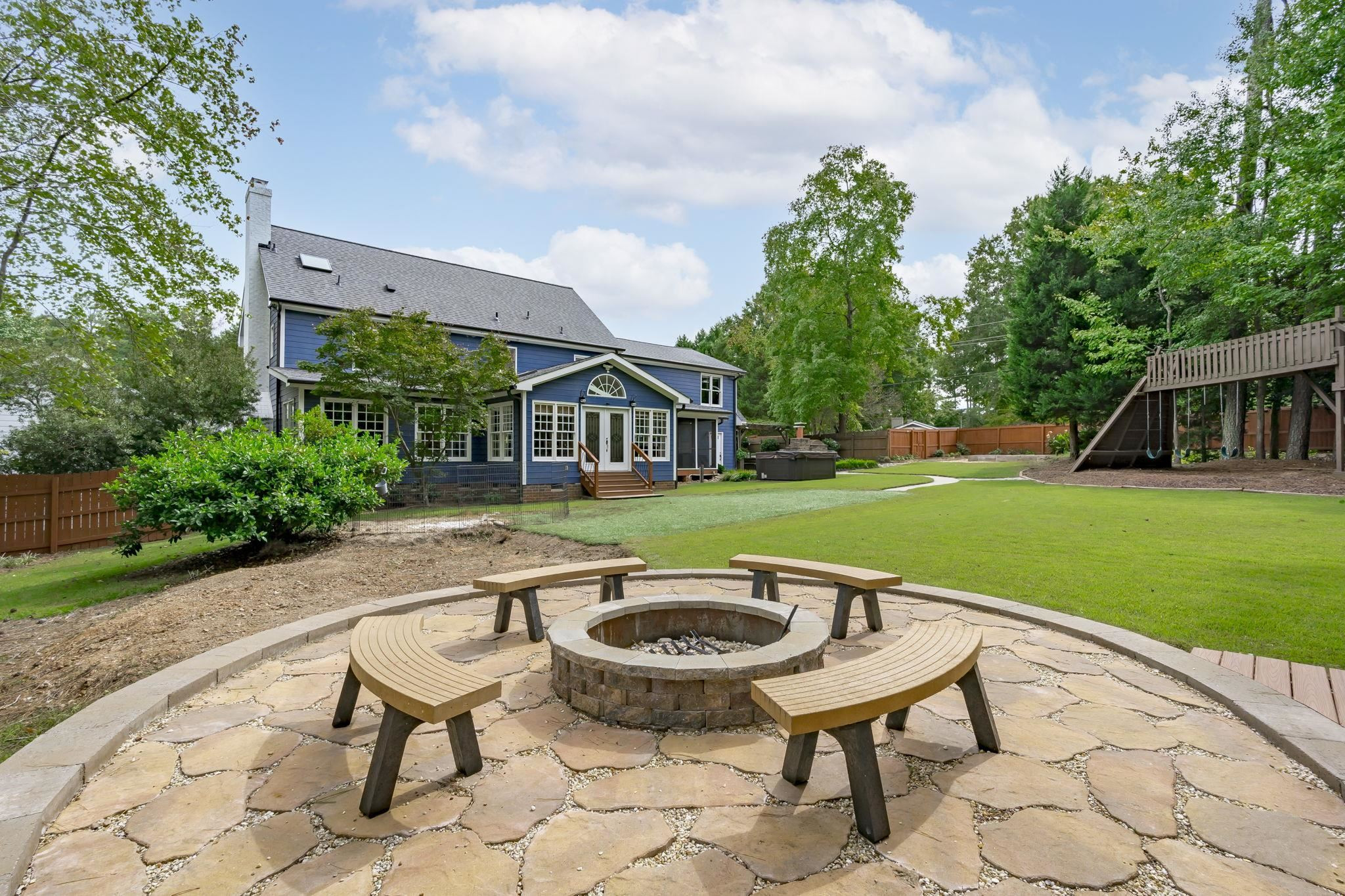 11301 Dunleith Drive Raleigh, NC 27614 - Photo 7 of 70 Stone fire pit area