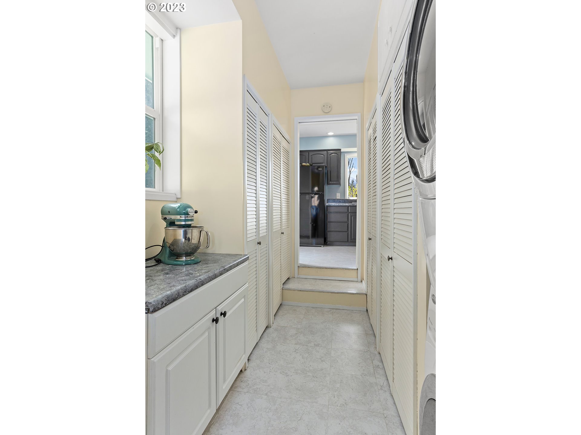 390 Northwest Chesser Road Stevenson, WA 98648 - Photo 29 of 42 a hallway with a sink and cabinets
