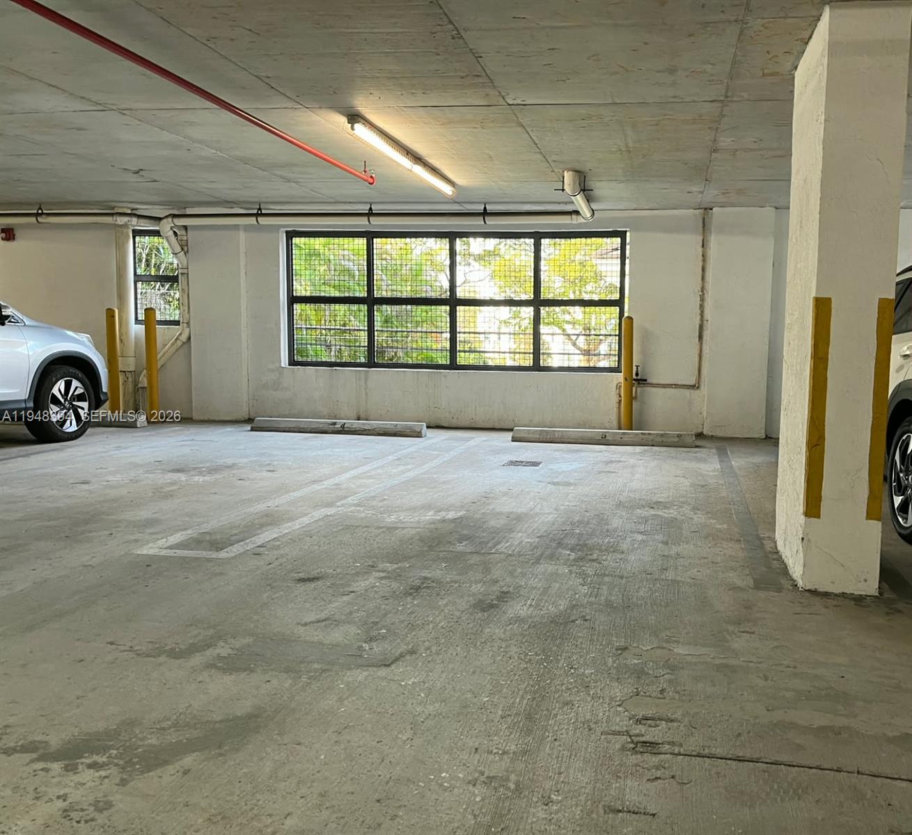 2650 Southwest 37th Avenue, Unit 604 Miami, FL 33134 - Photo 4 of 22 a view of a livingroom with a fireplace