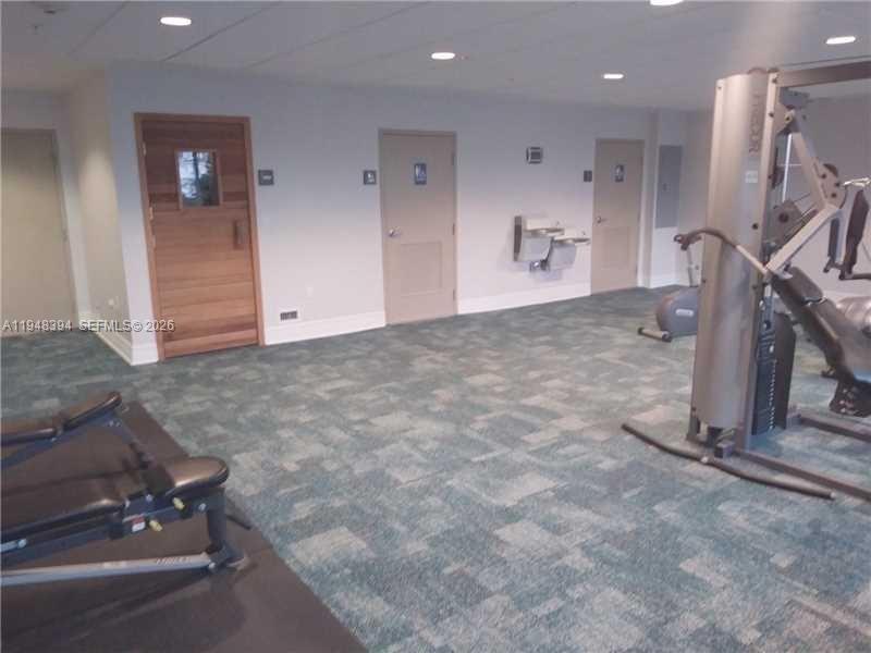 2650 Southwest 37th Avenue, Unit 604 Miami, FL 33134 - Photo 7 of 22 a view of a hallway