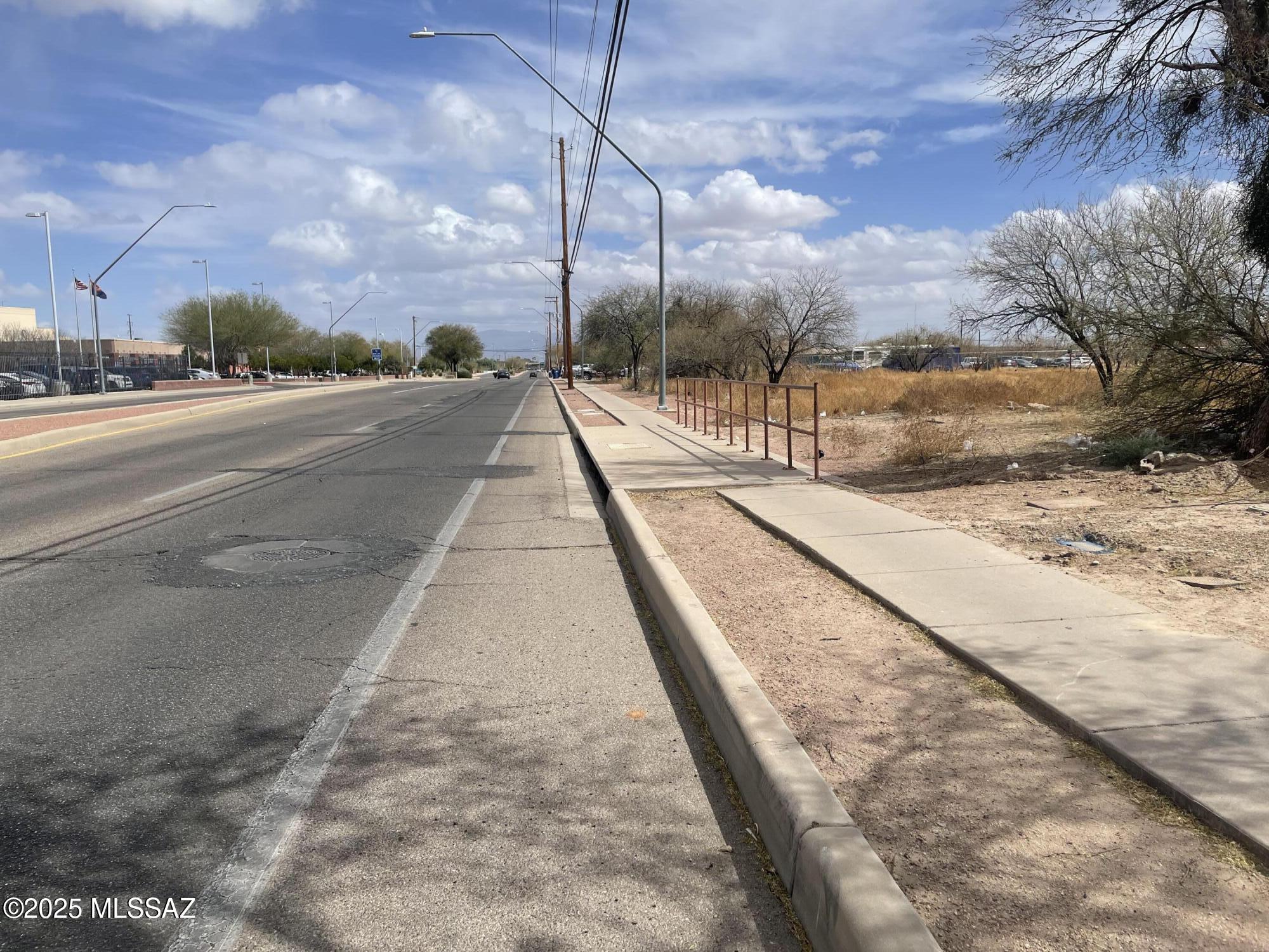 1251 West Silverlake Road Tucson, AZ 85713 - Photo 4 of 7 a view of a street with a yard