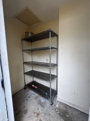 a backyard of a house with yard and garage