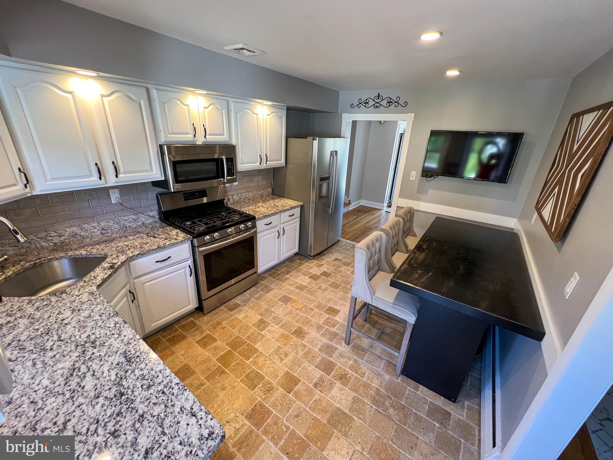 725 Evans Road Springfield, PA 19064 - Photo 24 of 49 Granite countertops & SS Appliances