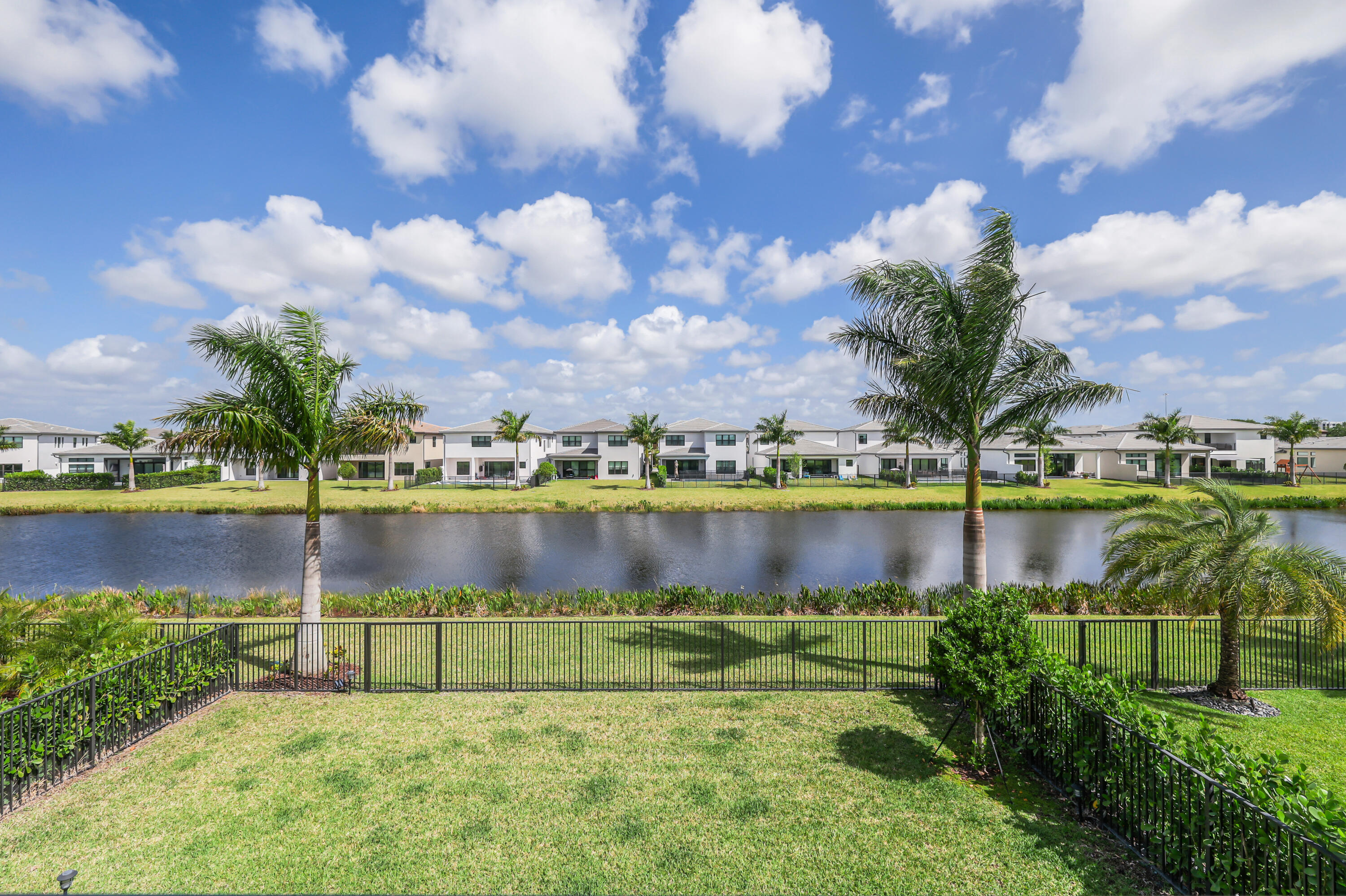 8283 Royal County Down Road Boca Raton, FL 33434 - Photo 35 of 88 a view of a lake with a big yard