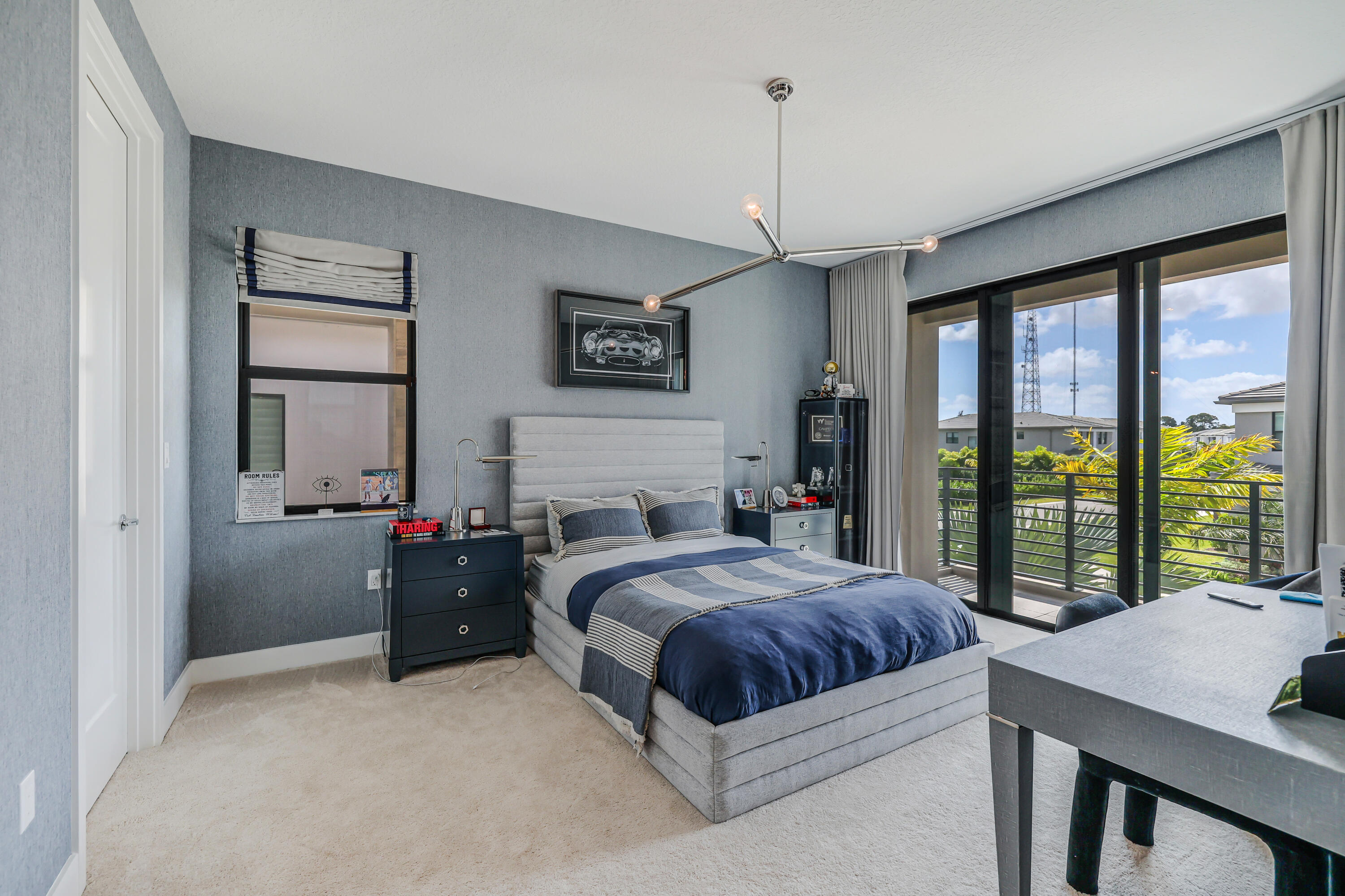 8283 Royal County Down Road Boca Raton, FL 33434 - Photo 49 of 88 a bedroom with a bed and a large window