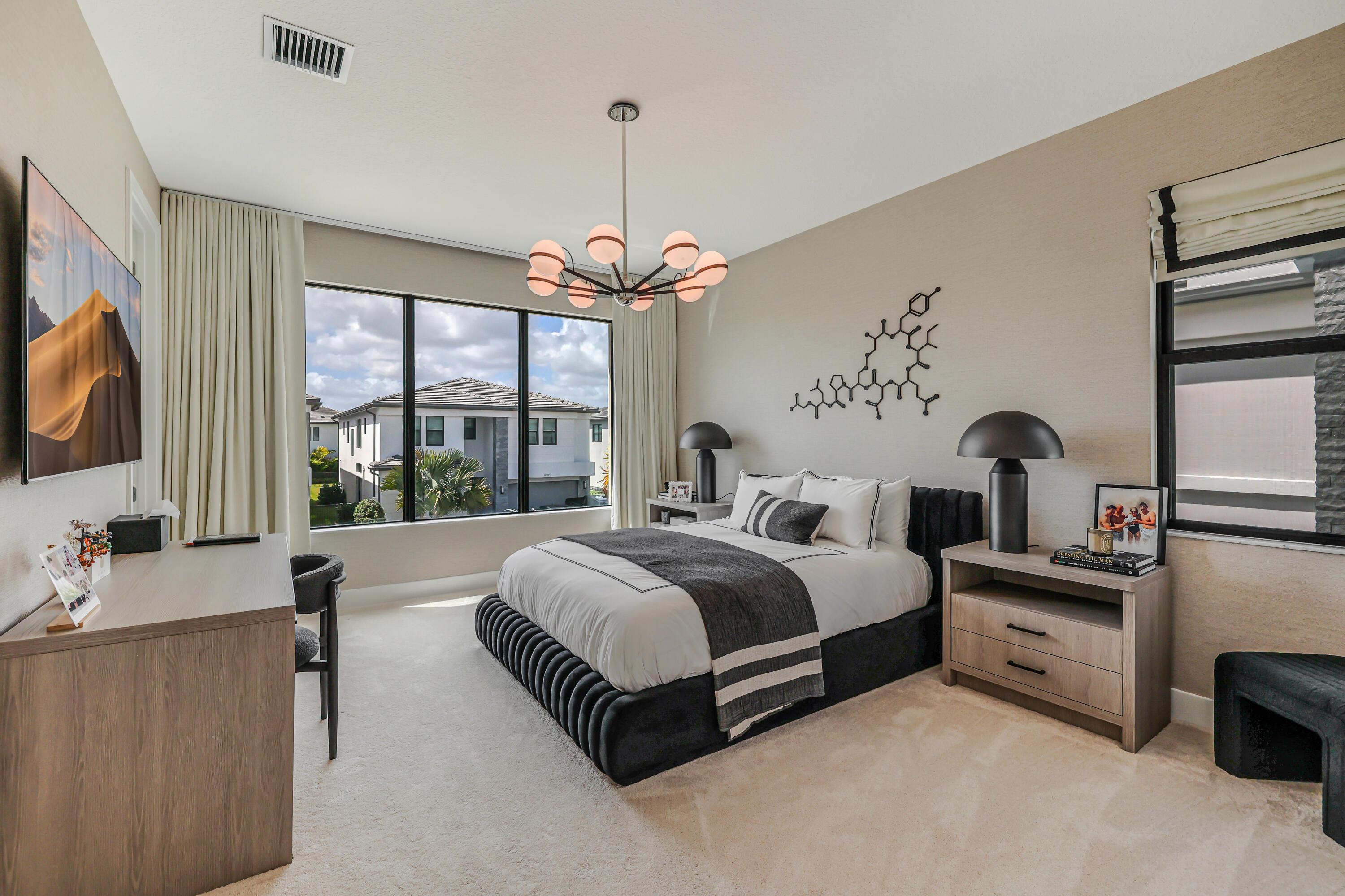 8283 Royal County Down Road Boca Raton, FL 33434 - Photo 53 of 88 a spacious bedroom with a bed and a flat tv screen