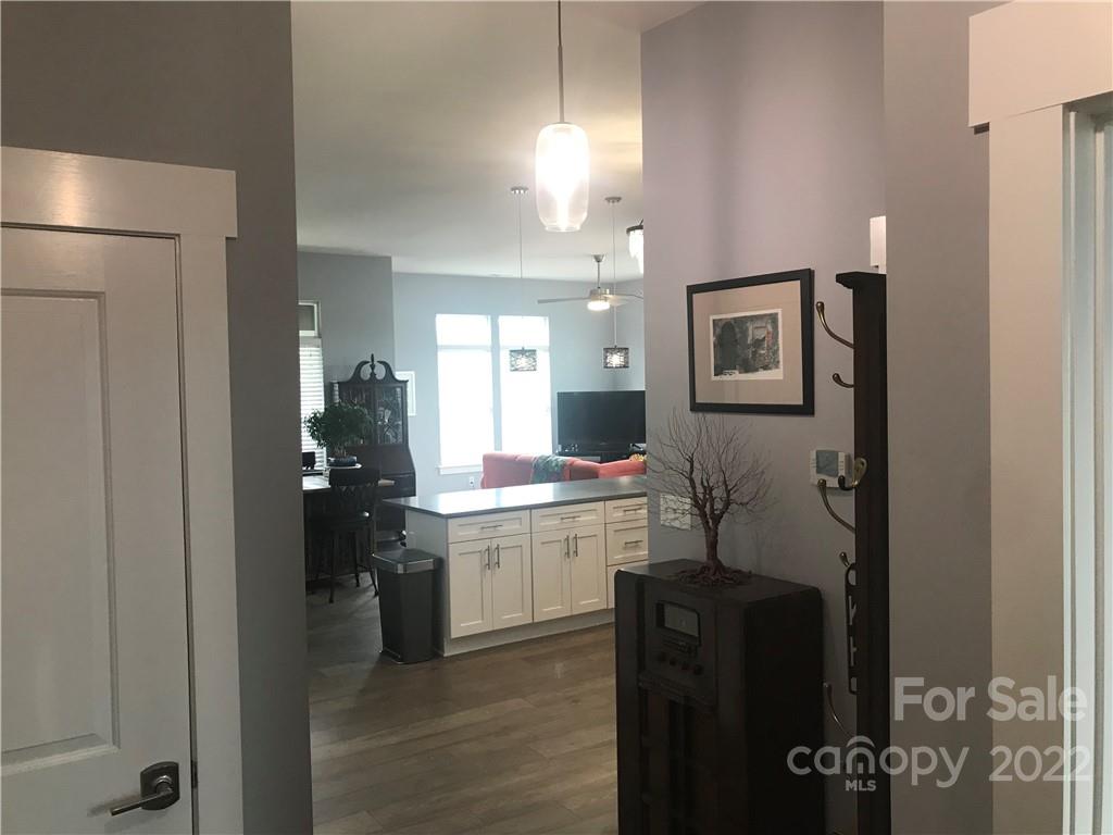 935 McAlway Road, Unit 306 Charlotte, NC 28211 - Photo 14 of 35 a kitchen with a sink and cabinets