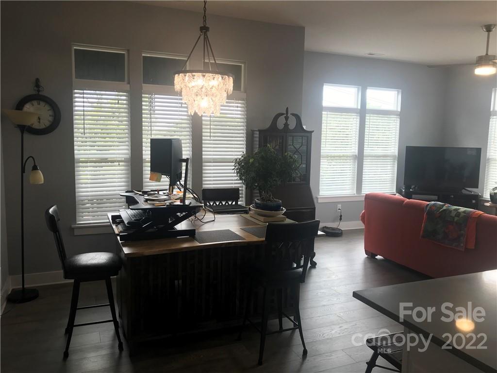 935 McAlway Road, Unit 306 Charlotte, NC 28211 - Photo 19 of 35 a view of a dining room with furniture and window