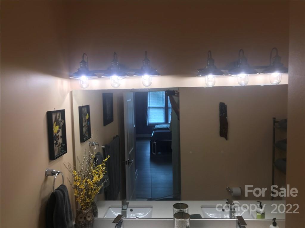 935 McAlway Road, Unit 306 Charlotte, NC 28211 - Photo 30 of 35 a view of a bathroom with a sink