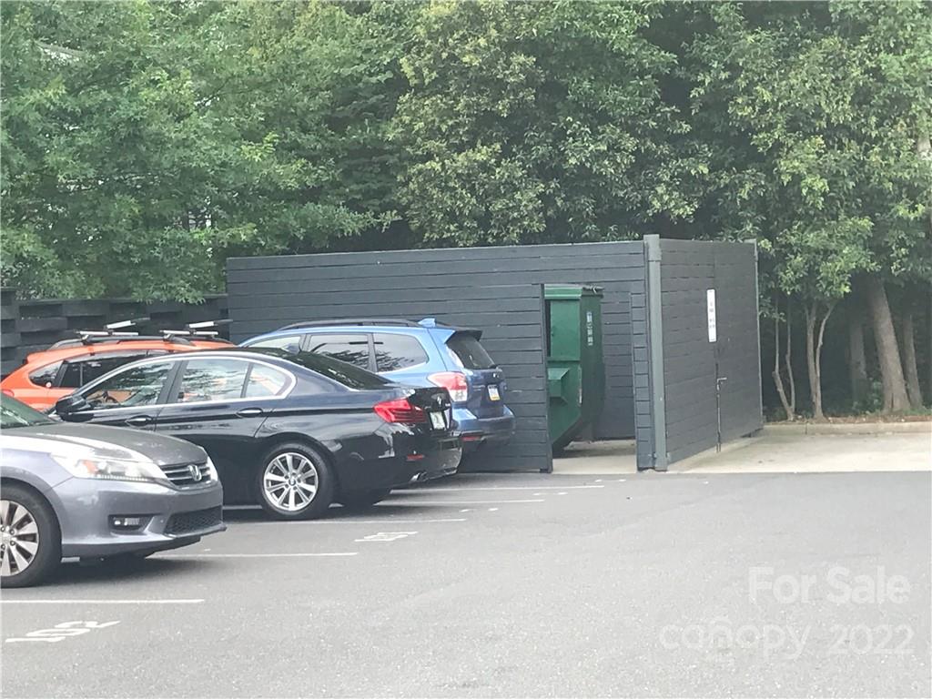 935 McAlway Road, Unit 306 Charlotte, NC 28211 - Photo 5 of 35 a car parked in front of a white house