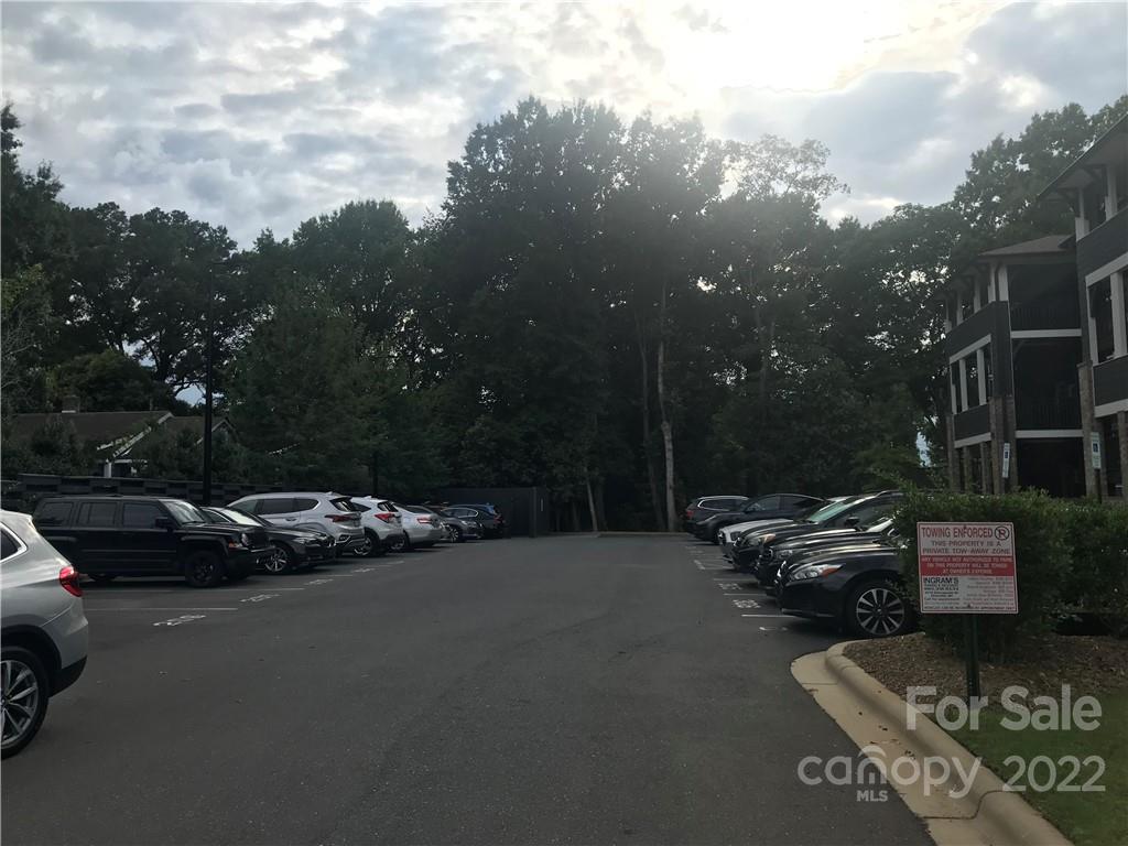 935 McAlway Road, Unit 306 Charlotte, NC 28211 - Photo 6 of 35 a car parked on the side of a street