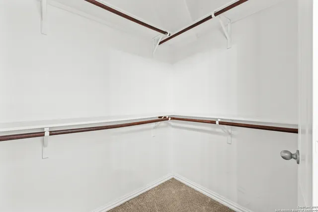 a view of small space with racks on the wall