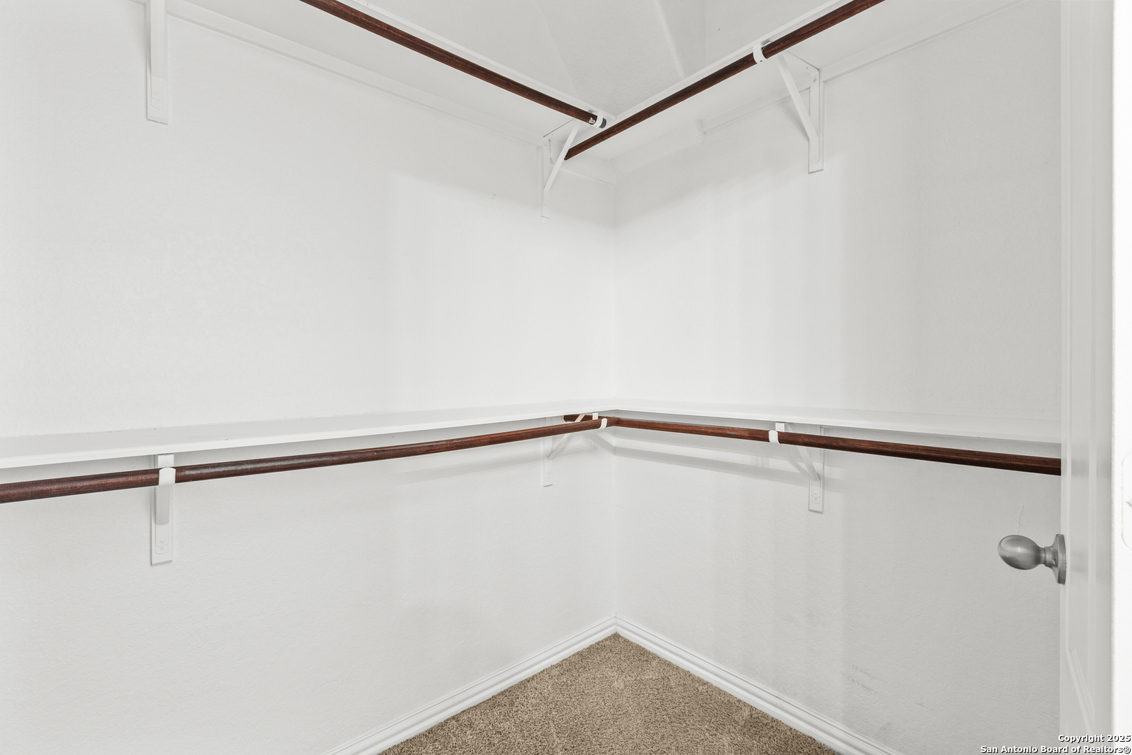 7616 Mission Summit Boerne, TX 78015 - Photo 18 of 22 a view of small space with racks on the wall