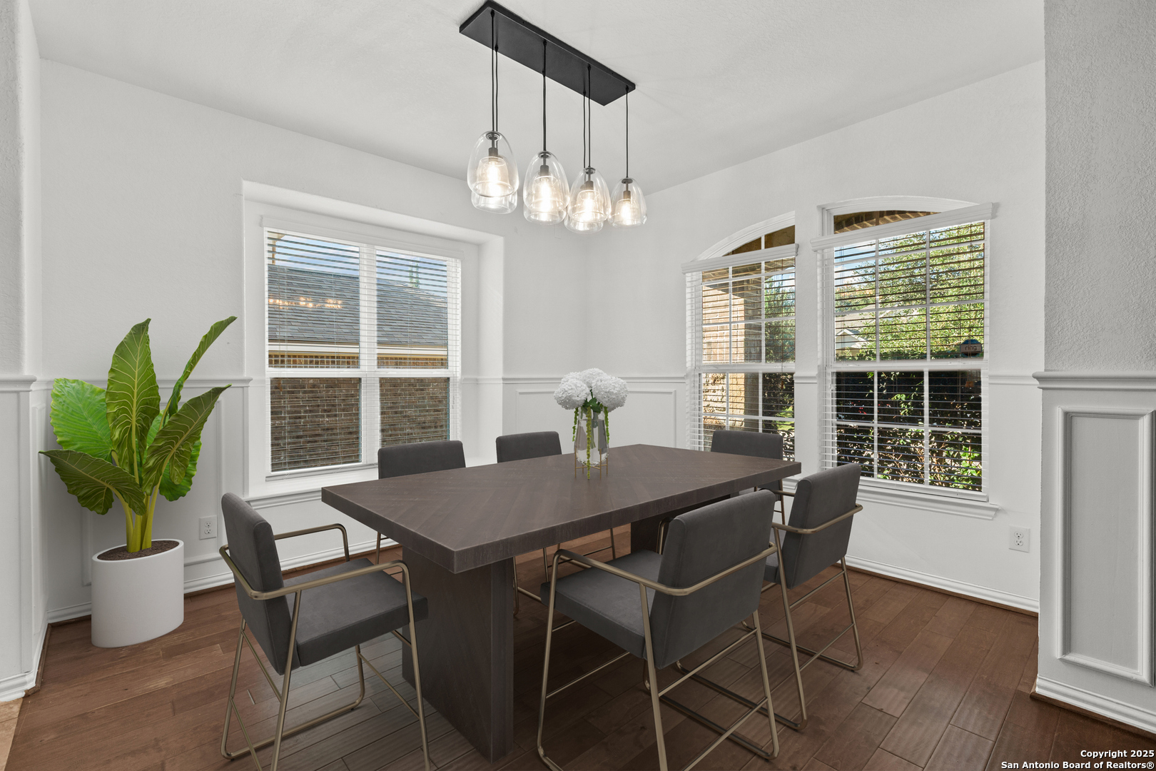 7616 Mission Summit Boerne, TX 78015 - Photo 4 of 22 a view of a dining room with furniture window and wooden floor