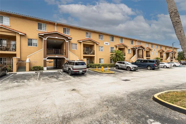 a view of a street with cars