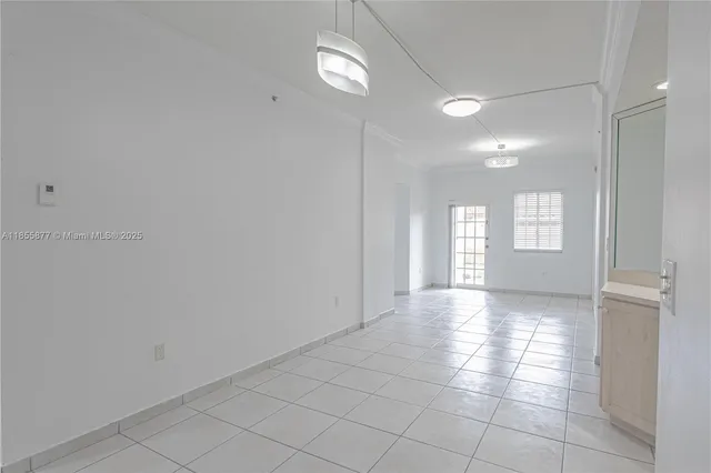 a kitchen with appliances cabinets and a sink