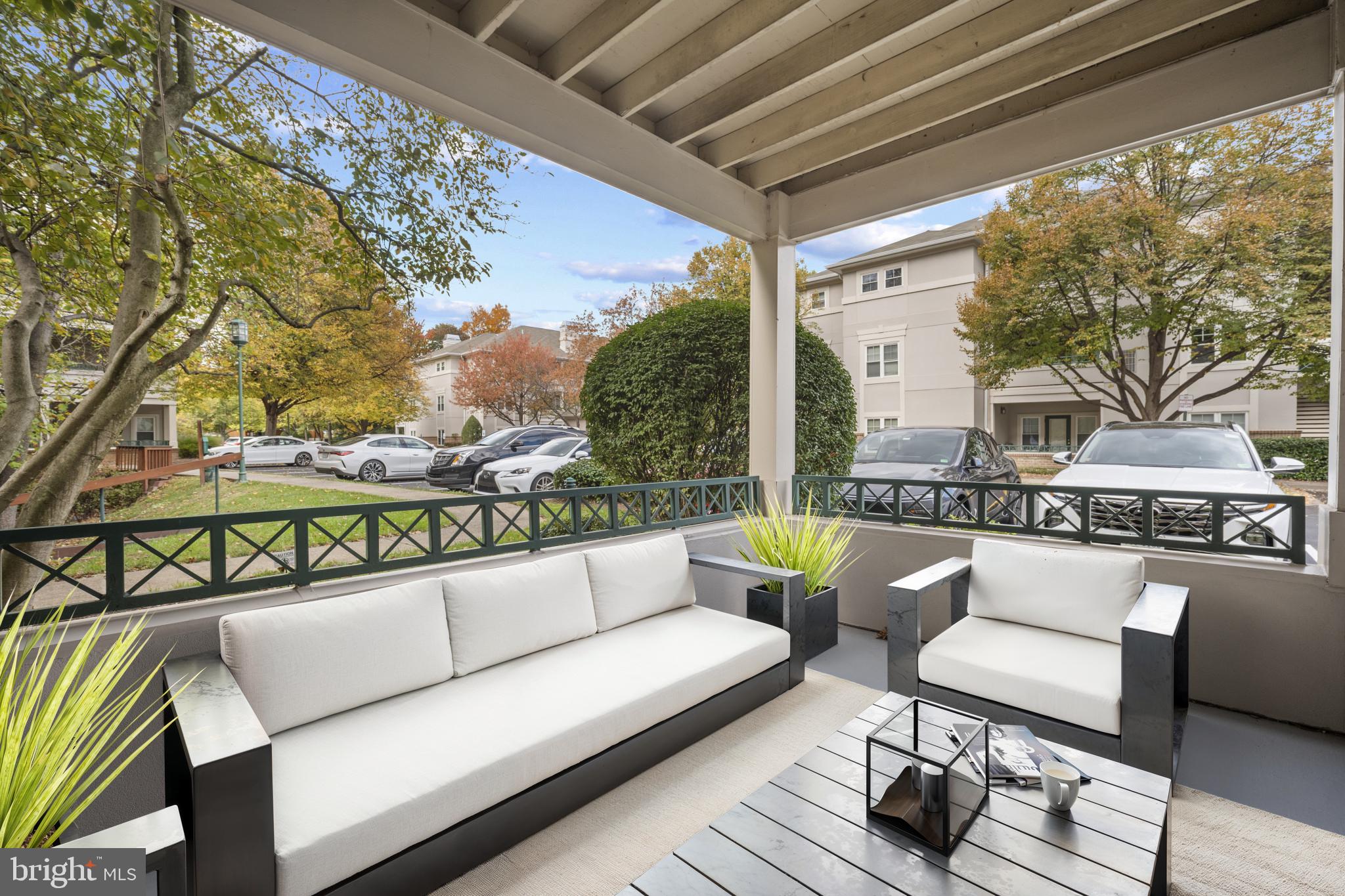 12005 Taliesin Place, Unit 16 Reston, VA 20190 - Photo 26 of 33 a view of a chairs in a balcony