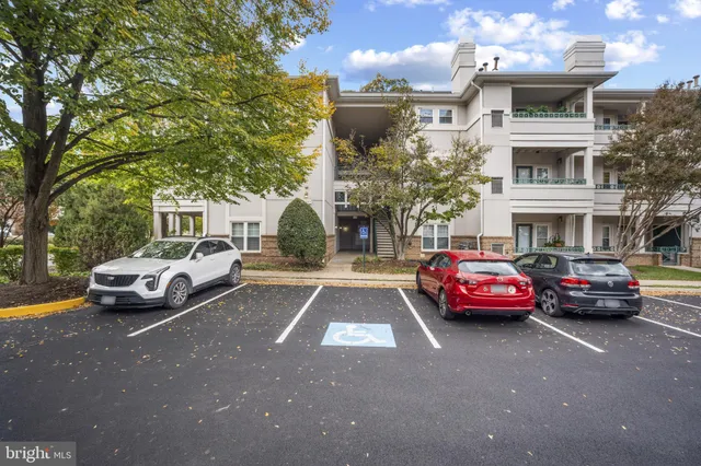 a view of street with parked cars