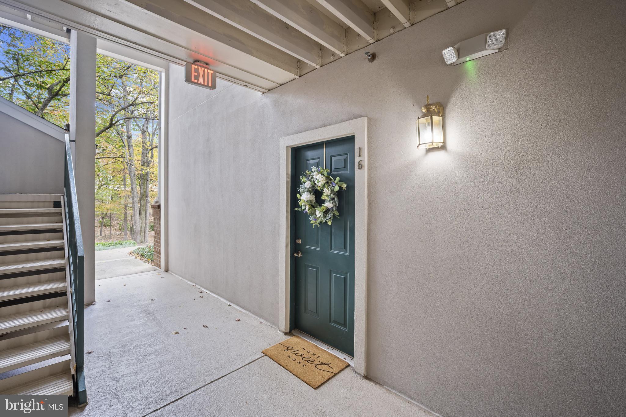 12005 Taliesin Place, Unit 16 Reston, VA 20190 - Photo 5 of 33 a view of a hallway with windows