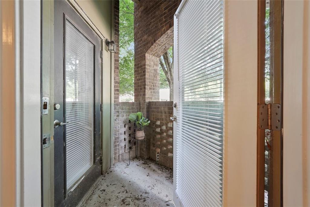 898 Oak Street Southwest, Unit 1105 Atlanta, GA 30310 - Photo 7 of 20 a view of a porch with a door