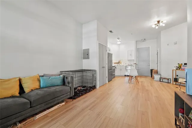 a living room with furniture and a couch