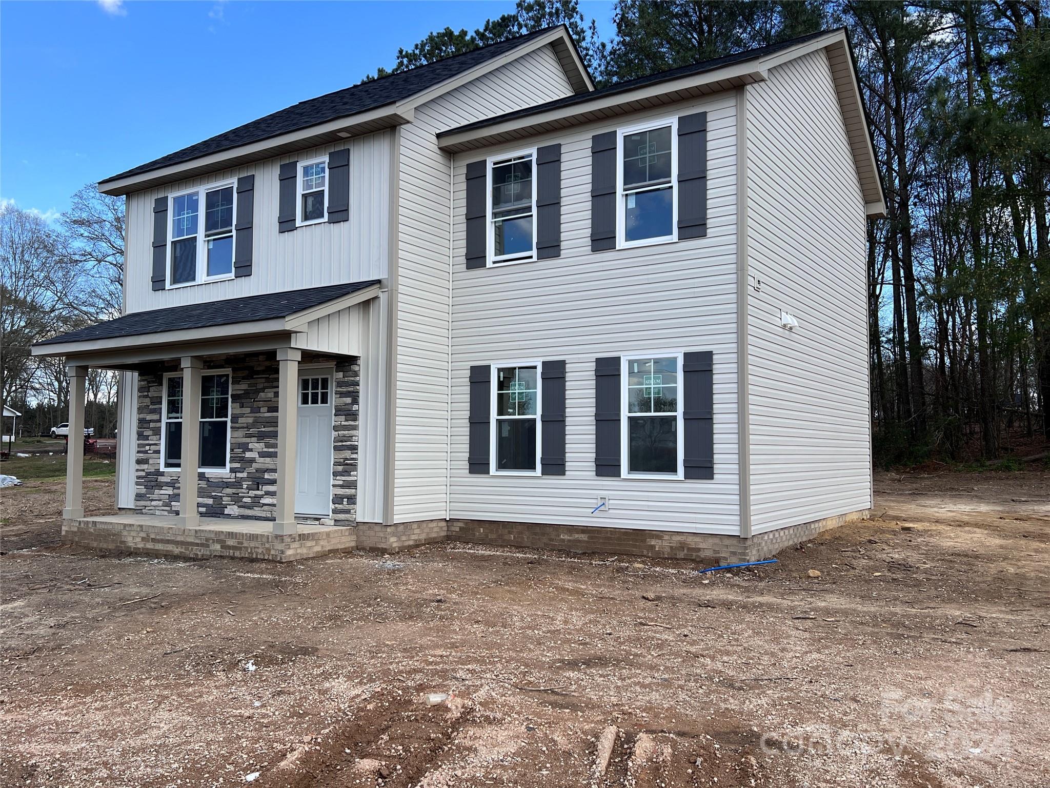 3610 Olive Branch Road Monroe, NC 28110 - Photo 13 of 15 a front view of a house with garden