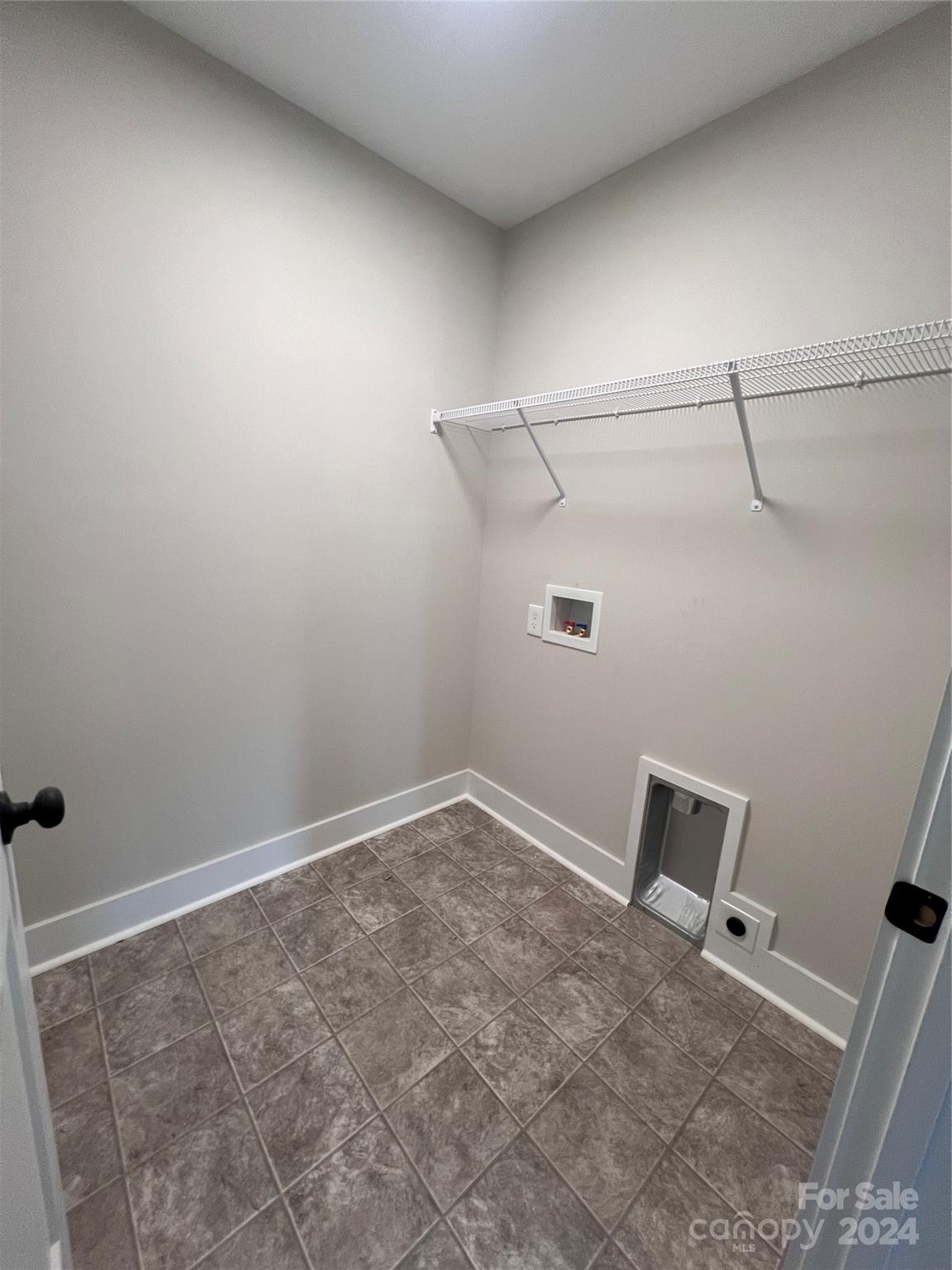 3610 Olive Branch Road Monroe, NC 28110 - Photo 8 of 15 a view of a room with racks on the wall
