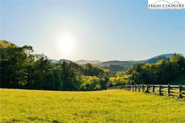 a view of lake with mountain