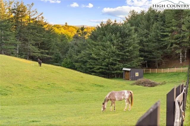 a view of an ocean from a mountain