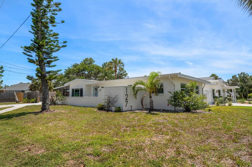 127 11th Avenue Indian Rocks Beach, FL 33785 - Photo 33 of 63 a view of a house with a yard