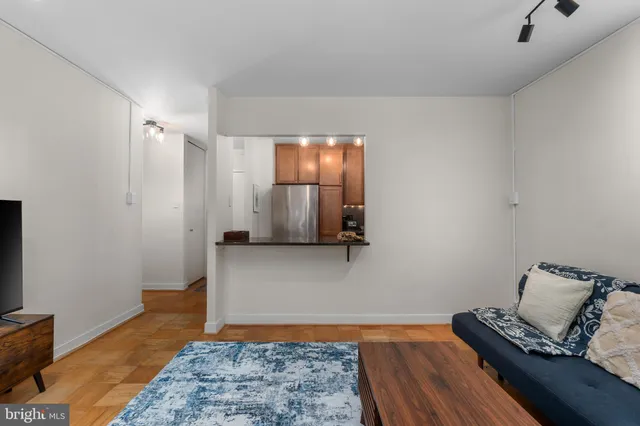 a bedroom with bed and window