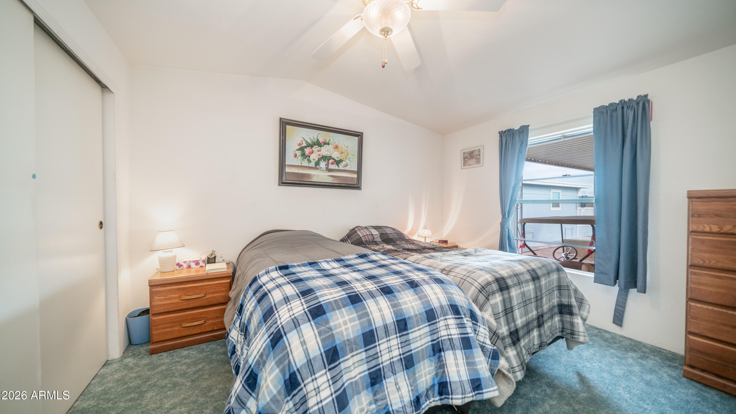 747 East Germann Road, Unit 92 San Tan Valley, AZ 85140 - Photo 15 of 39 a bedroom with a bed and a window