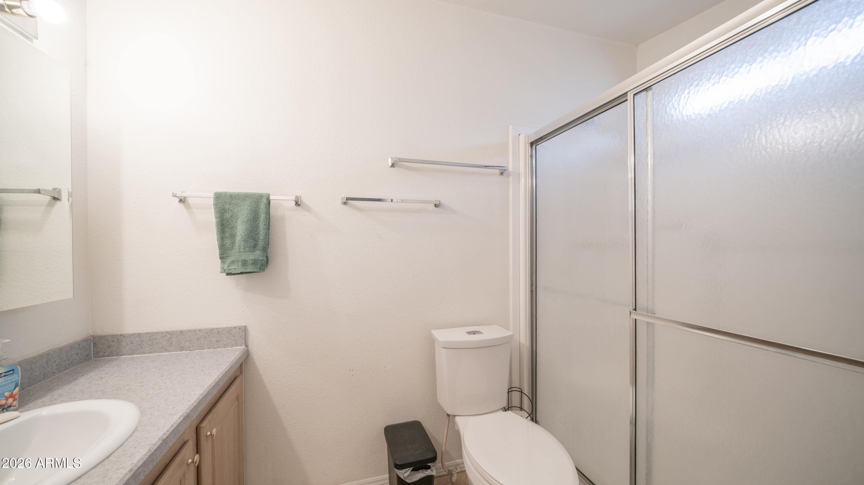 747 East Germann Road, Unit 92 San Tan Valley, AZ 85140 - Photo 18 of 39 a bathroom with a granite countertop toilet sink and mirror