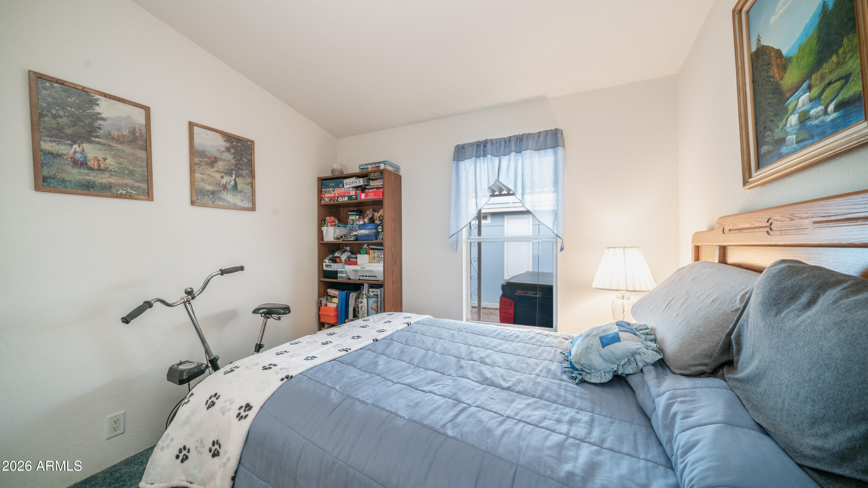 747 East Germann Road, Unit 92 San Tan Valley, AZ 85140 - Photo 20 of 39 a bedroom with a bed and a window