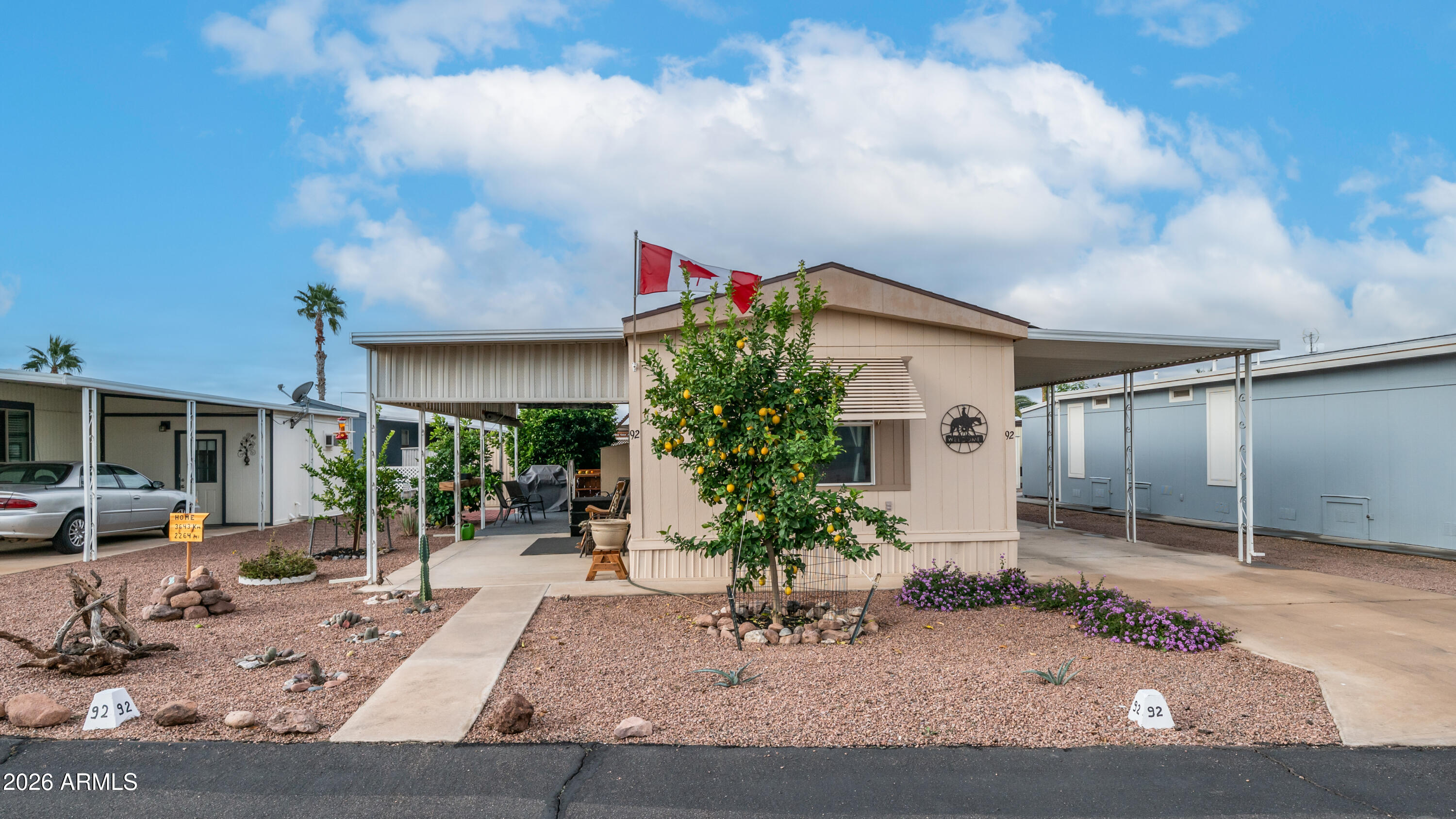 747 East Germann Road, Unit 92 San Tan Valley, AZ 85140 - Photo 2 of 39 a house view with a sitting space