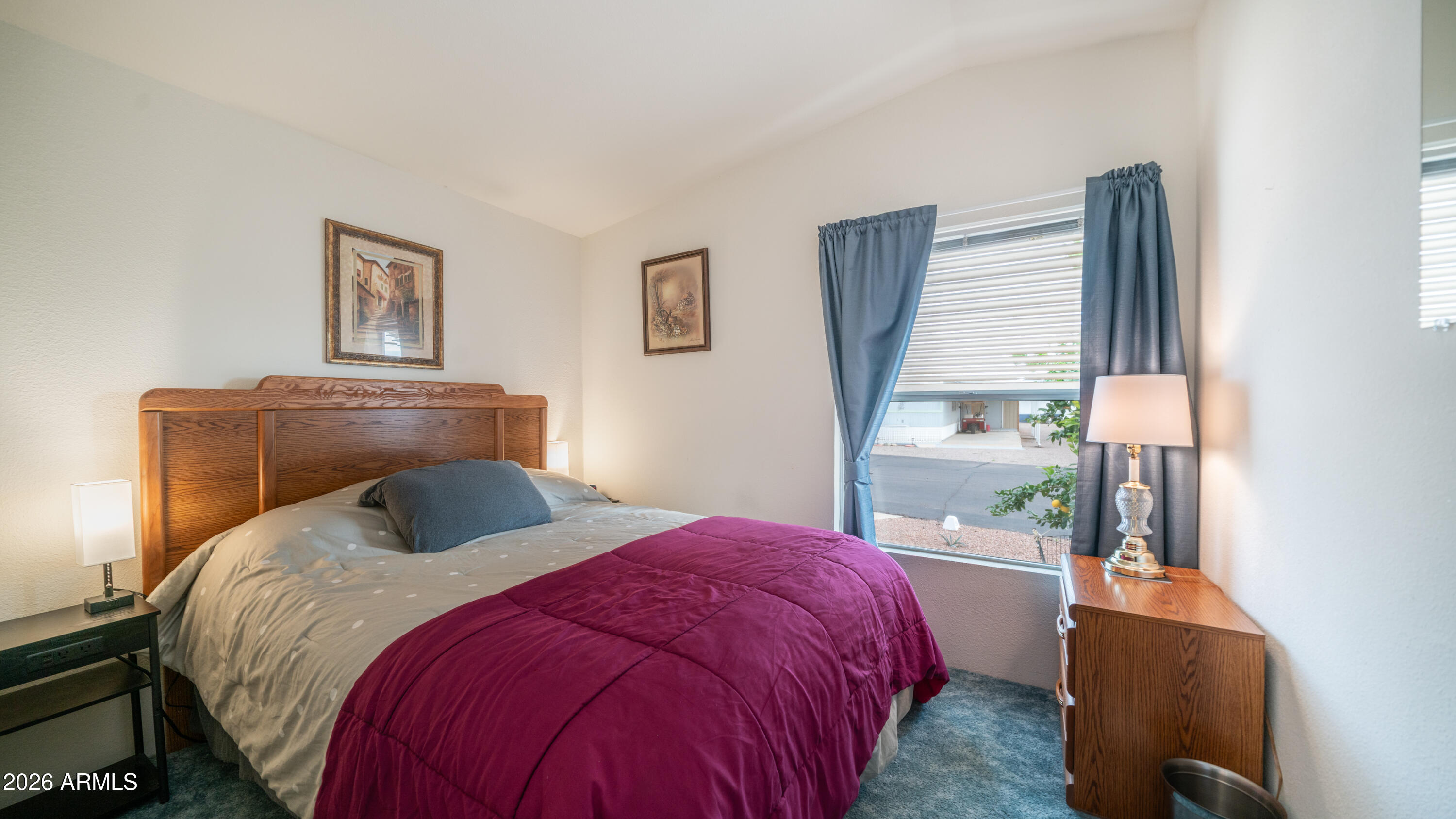 747 East Germann Road, Unit 92 San Tan Valley, AZ 85140 - Photo 21 of 39 a bedroom with a bed and window