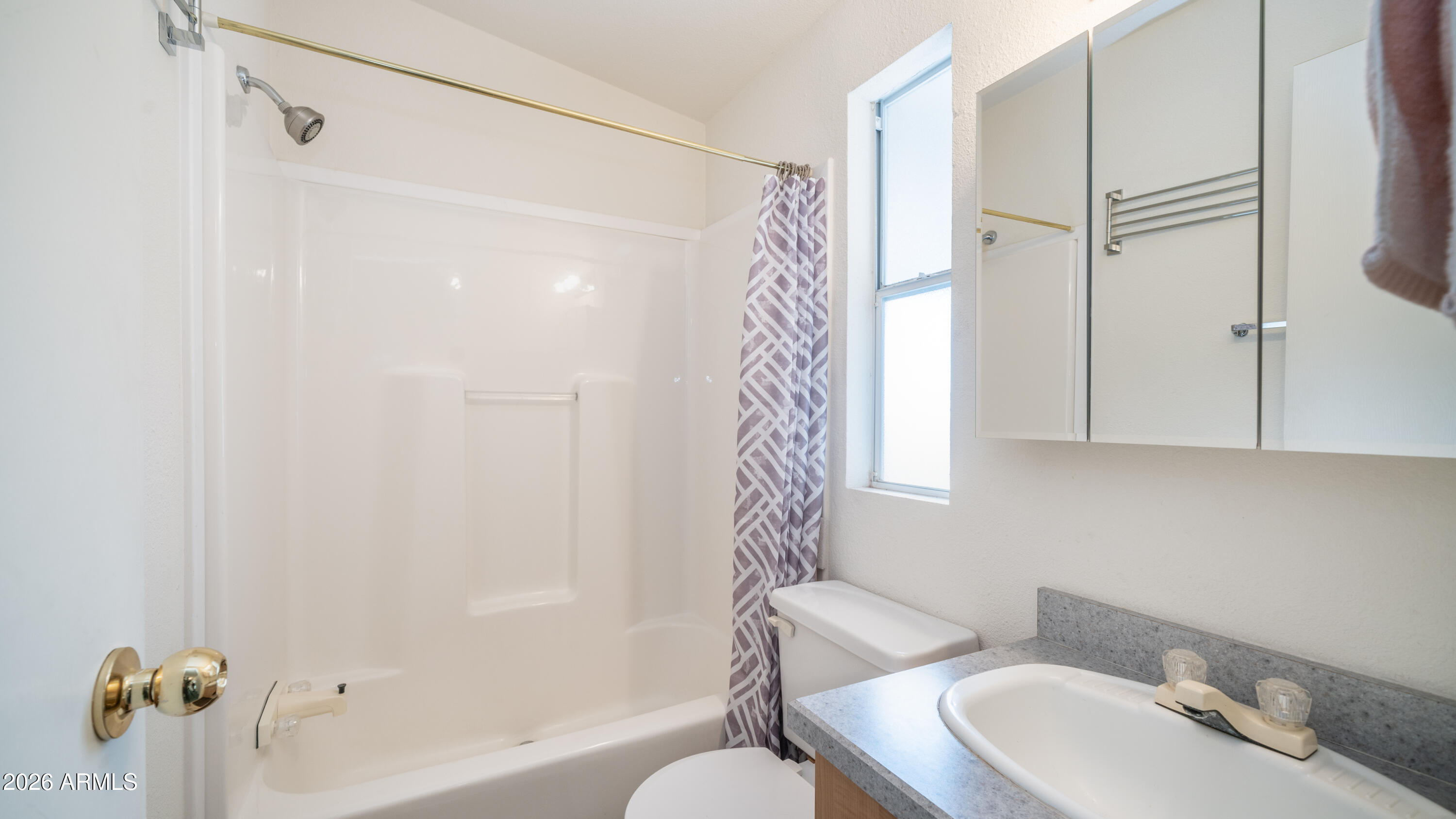 747 East Germann Road, Unit 92 San Tan Valley, AZ 85140 - Photo 22 of 39 a bathroom with a granite countertop sink toilet and shower