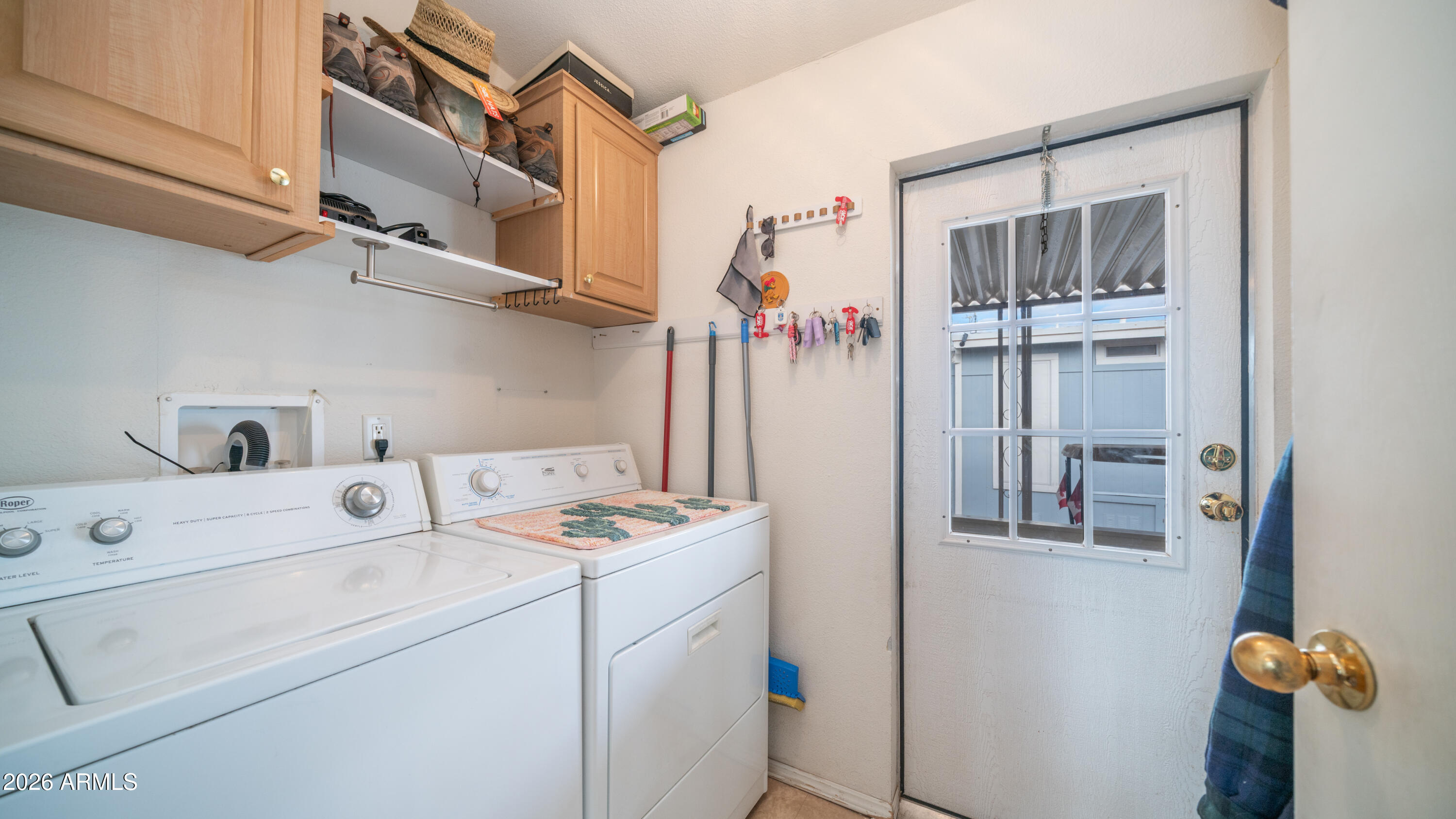 747 East Germann Road, Unit 92 San Tan Valley, AZ 85140 - Photo 23 of 39 a utility room with dryer and washer