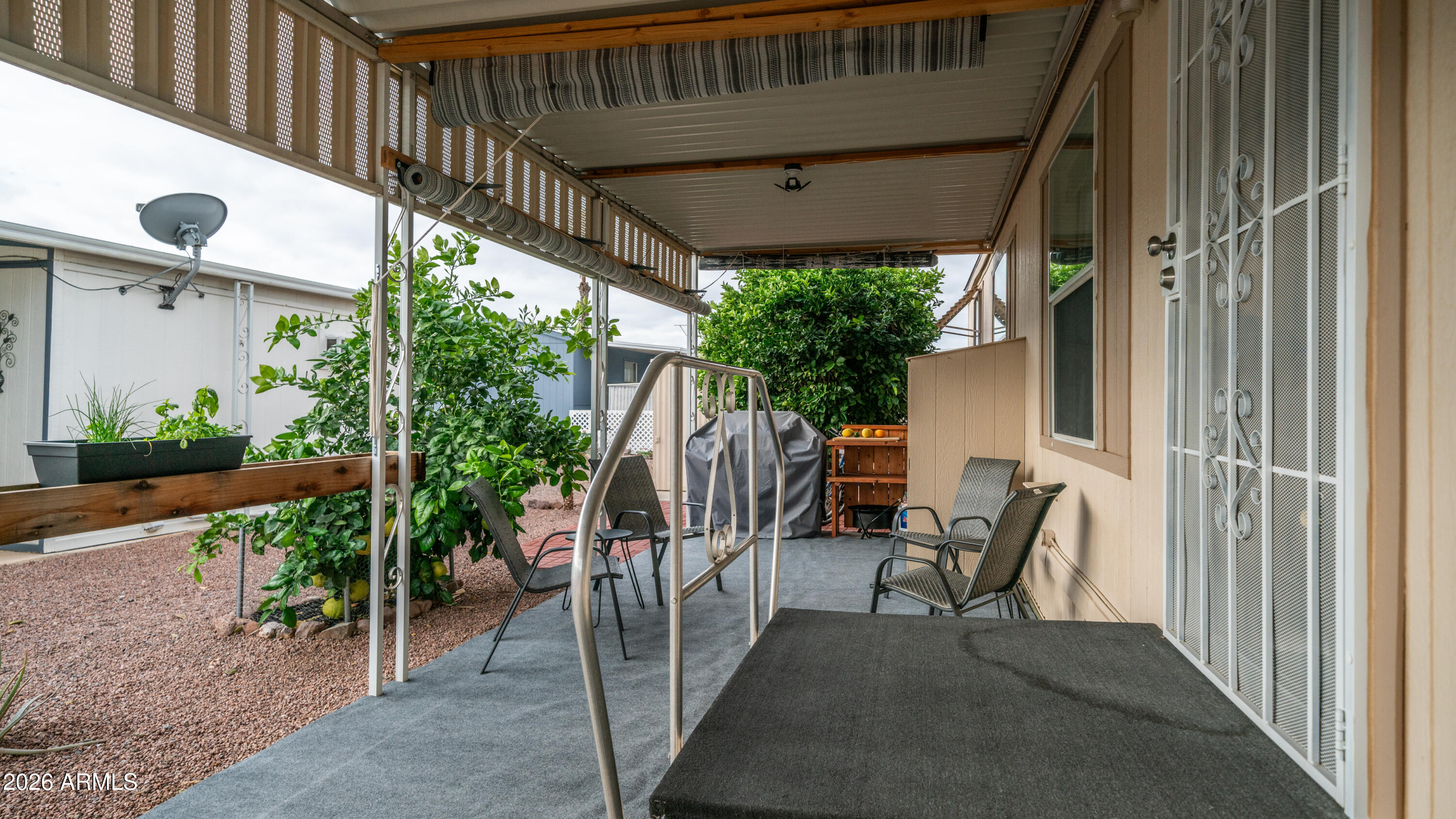 747 East Germann Road, Unit 92 San Tan Valley, AZ 85140 - Photo 6 of 39 a view of balcony with furniture and garden