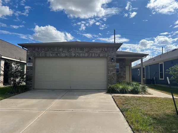 a view of a house with a garage
