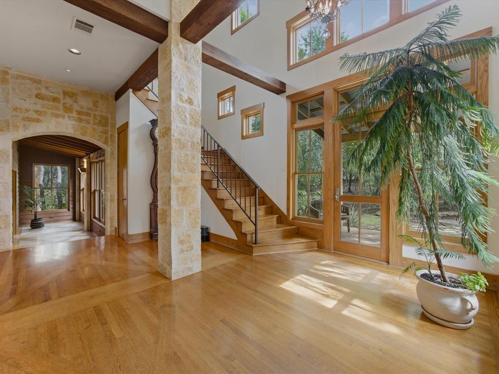 151 Trinity Bluffs Road Aledo, TX 76008 - Photo 9 of 40 a view of entryway and hall with wooden floor